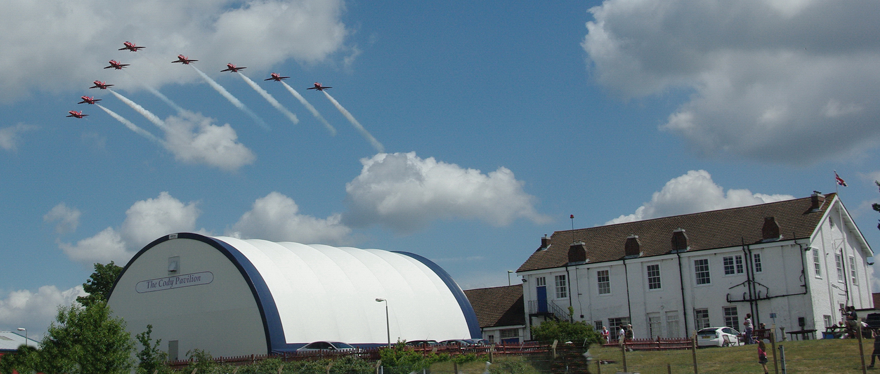 Red Arrows over FAST Museum, Farnborough